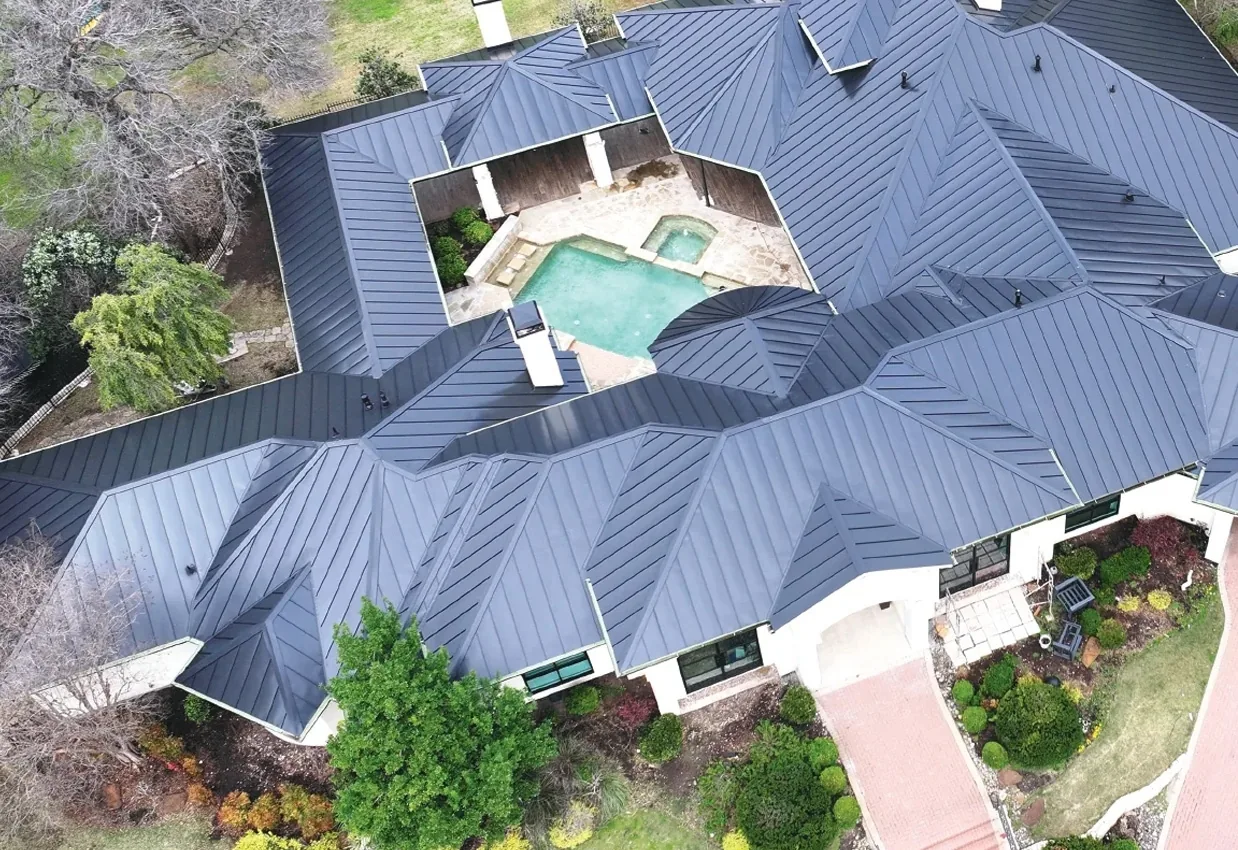 Gunmetal standing seam metal roof on large Colorado estate