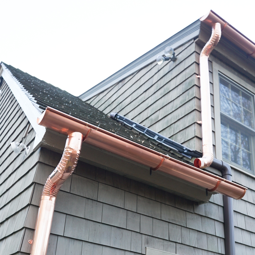 Copper seamless gutter system on custom Colorado home - Impact Exteriors